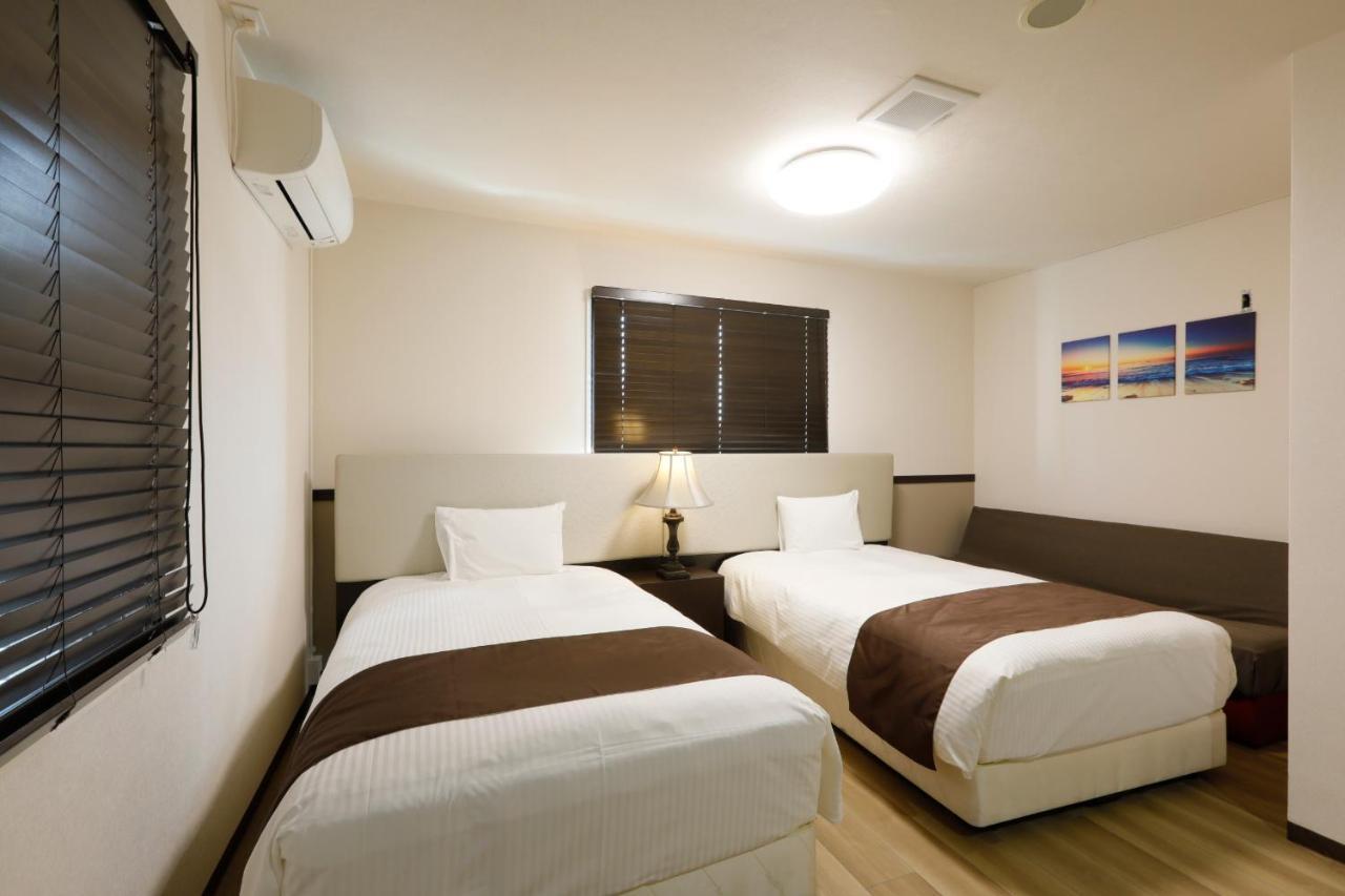 Phoenix Park Hotel Nago Exterior photo